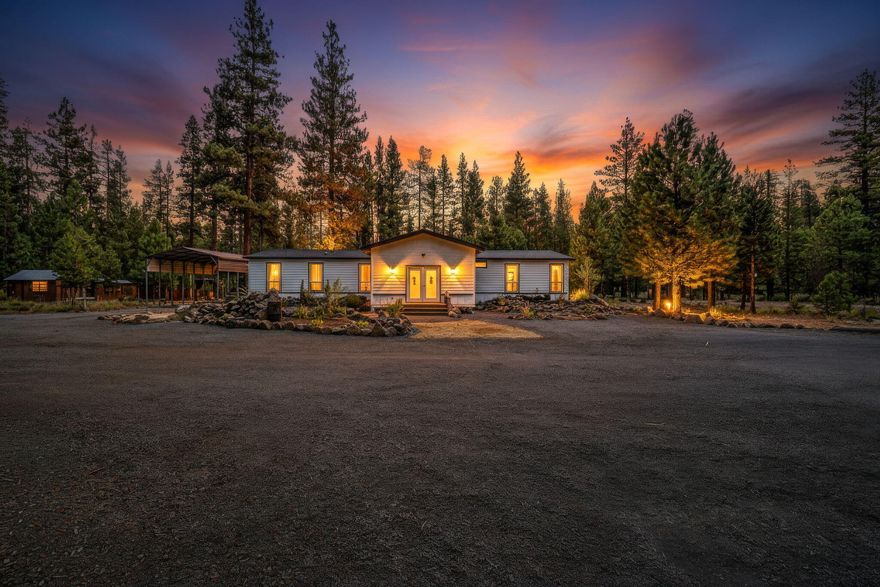 Discover this unique opportunity just min from La Pine State Park, Sunriver, & Quail Run Golf Course! This 3 bed, 2 bath home sits on 20 acres, 15 of which are mature, harvestable timber. Spacious front entry addition awaits your finishing touch. Inside, 9' ceilings, a massive great room & bright living areas. Chef's kitchen boasts a central island, abundant cabinetry, farmhouse sink, pantry & large dining area. Primary separation includes an expansive suite w/dual sinks, soaking tub, tiled shower w/bench & walk-in closets. 2 addtnl bedrooms share a full bath. Laundry & mudroom w/built-ins add functionality. Enjoy private trails leading to BLM land, 1-acre fenced paddock, 2 stalls, tack room & 40' round pen. Exterior plumbing & electrical are ready for an outdoor kitchen. Grounds ftr RV sites, power, multiple gathering spaces, a tiny home & rustic cabin—ideal for guests, income, or retreats. Endless potential for private living, horse property, or investment opportunity!