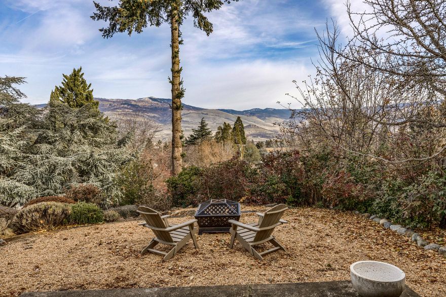 Sought after location, just above the boulevard, this 1848 SF move-in ready single level home offers 3 spacious bedrooms and 2 full baths. The open floorplan has great natural light throughout. Freshly painted kitchen cabinets, stainless steel appliance, plenty of cooking space.  French doors lead to a covered patio in the backyard.  There is a cozy bench sitting area perfectly situated next to the kitchen and a large great room to take in the surrounding mountain views. The primary ensuite titled bathroom includes a walk-in shower and granite vanity. New carpet and fresh interior paint.  Plenty of storage including a backyard shed.  There is a workshop space or perfect home office located next to the one car garage. Plenty of room for all your outdoor entertaining needs with sitting areas in the front and back yards.