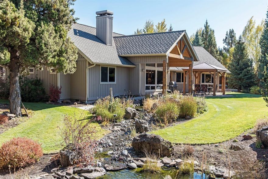 Amazing property, builders own home. Stone and pine log entry, custom kitchen, river rock fireplace. Great Cascade Mtn. views out of almost every room. Mature trees, professional landscaping, secluded country feel close to Bend. This is a must see property. 3 stall barn with pasture, insulated & heated detached shop with 22x35 motor home bay, 22x44 3rd bay for your boat/RV/toys and a 900 sq. ft. guest quarters upstairs. Attached 4 car garage as well as detached 4 car garage. Property has a greenhouse, garden area, 2 ponds, a beautiful water feature, paver patio and multiple caves on the property! This is Central Oregon at its best.