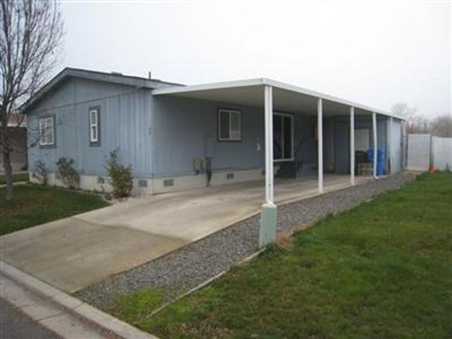 Banked owned 4 bedroom, 2 bath, 1620 sq ft. Needs new carpet ask for allowance Kitchen has gas stove, microwave and huge pantry.Large living/dining rooms, BIG laundry room w/room for freezer and more. Nicely landscaped yard w/water feature. One yr. Home warranty. Bring all offers