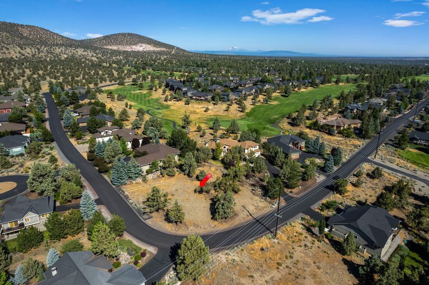 Perfectly located vacant lot in The Ridge in Eagle Crest Resort with views of Smith Rock and the Ochoco Mountains. This gently sloped corner lot near The Ridge Sports Center, with access to trails, is BUILDER READY with your vision! Eagle Crest Resort is a Full-Service Destination Resort located along the Deschutes River just outside the city of Redmond, Oregon on 1700 acres in the high desert of Central Oregon offering championship golf, world-class fly fishing, indoor/outdoor tennis, and pickleball, three sports centers with pools, dining establishments, a lodge and conference center, and miles of biking and hiking trails. From an active lifestyle to a relaxing retreat, Eagle Crest Resort is the perfect place to call home.