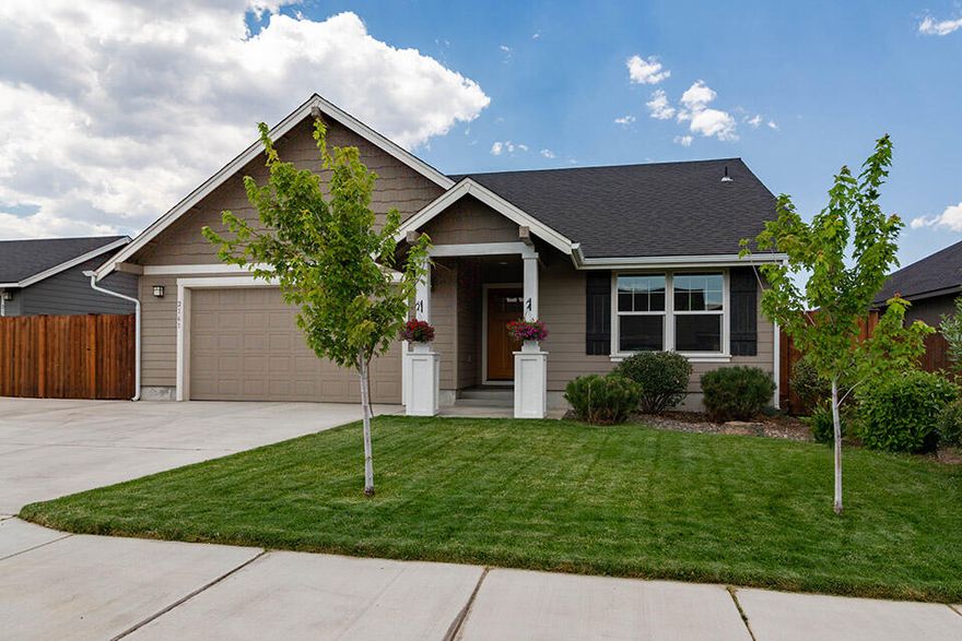 Don't miss this gem with mountain views! Located in NE Redmond near the hospital and the new shops at Red Rock Center opening soon! Vaulted ceilings make this open concept home feel bigger, light and bright. The primary bedroom also has vaulted ceilings and bathroom with dual sinks and a walk-in closet. You can stay cool in the summer months with the A/C and the gas fireplace in the living room will help keep you warm in the winter. There is a two car garage with an oversized concrete pad in the front for parking. The back yard is fully fenced and the gate could be converted by the buyer to a bigger gate to park outdoor toys or a trailer. Woodhill Homes built this home with double wall construction and sound insulation between bedroom walls to help limit noise. The front yard is landscaped and has a sprinkler system. Home Warranty Included!