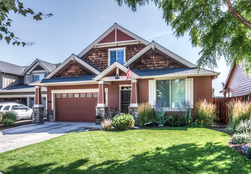 Quality build Pahlisch home, 2210 sq ft includes 4 bedrooms and 3 baths. Vaulted ceilings in the living room; open kitchen, dining, living room connected with unique archways. Hardwood floors in walkways, kitchen & dining room. Master suite on main level has separate access to back patio. Additional 2 bedroom and bath also on main level. Upstairs includes bonus room and junior master suite. Finish work includes painted trim throughout, tile countertops, custom wood cabinets, slate tile entry and laundry room leading into the garage. Back yard accessible from dining area and master bedroom includes large concrete/paver patio, grass, mature landscaping complete with underground sprinkler system. Dbl garage has man door to side yard. Front yard maintained through HOA, additional amenities include parks, walk paths, sport court, playground and pool.