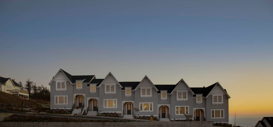 Searching for a townhome with panoramic ocean views and short term rental eligibility on the Oregon Coast? Townhouse 9 at Depoe Hills provides huge western and southern exposures that capture the pacific coastline in all of its beauty. This end unit is ideally positioned to take full advantage of natural light and ever changing vistas, all across the street from the community plaza. The main level features a spacious open concept living area that connects kitchen, dining, and lounge spaces, while upstairs, a generous primary suite is accompanied by two additional bedrooms and is perfect for guests, remote work, or a media room. With exceptional storage, oversized garages, and thoughtful floor plans, these townhomes are designed to accommodate both full time living and income producing potential. Preferred lender credit available at Closing, please inquire for details. Rental projections are available as well.