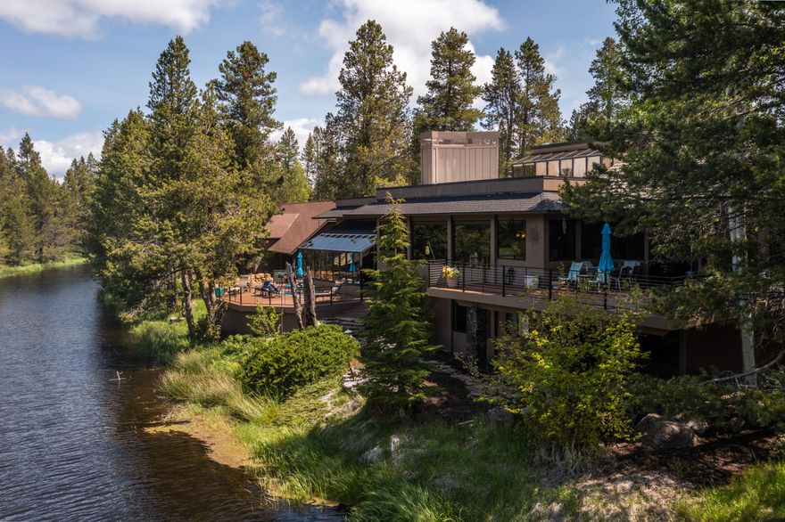 Live the Sunriver Dream in this iconic property known for having the finest river views.  Views from the living room or one of the multiple decks are unrivaled.  The Sunriver flows directly in front of the home, unobstructed views of the Deschutes River located in a wide bend with upper and lower river views, across the river is endless views of the meadows and national forest, ending with a view of Mt. Bachelor. This 10,161 square foot home boasts an indoor swimming pool, spa and waterfall, extensive woodwork, grand staircase, large open living on the main level, indoor garden, chef's kitchen, wine bar for entertaining, inviting breezeway, home office, multiple fireplaces, large gathering places, indoor gym, theater room, endless bedrooms, secret rooms to explore and cozy places to read and relax. It is impossible to describe this legendary property in one paragraph.  Sold partially furnished.