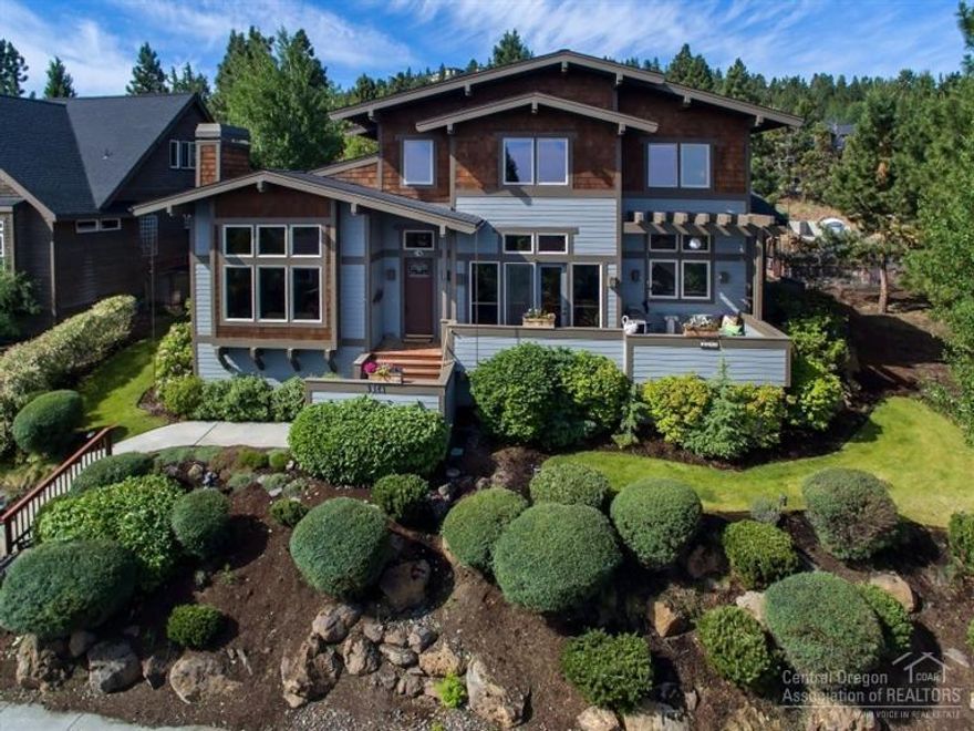 Uncompromised quality throughout this exceptional custom view home! Desirable Westside location; features include a beautifully appointed chef's kitchen w/sub-zero & granite slab; towering ceilings w/walls of windows; elegant hardwood floors; large main level master suite w/private decking to a lovely landscaped backyard w/tranquil water feature! Expansive decks that capture dramatic easterly mountain views, triple car garage w/level alley driveway. A remarkable space to call home w/perfect outdoor living!