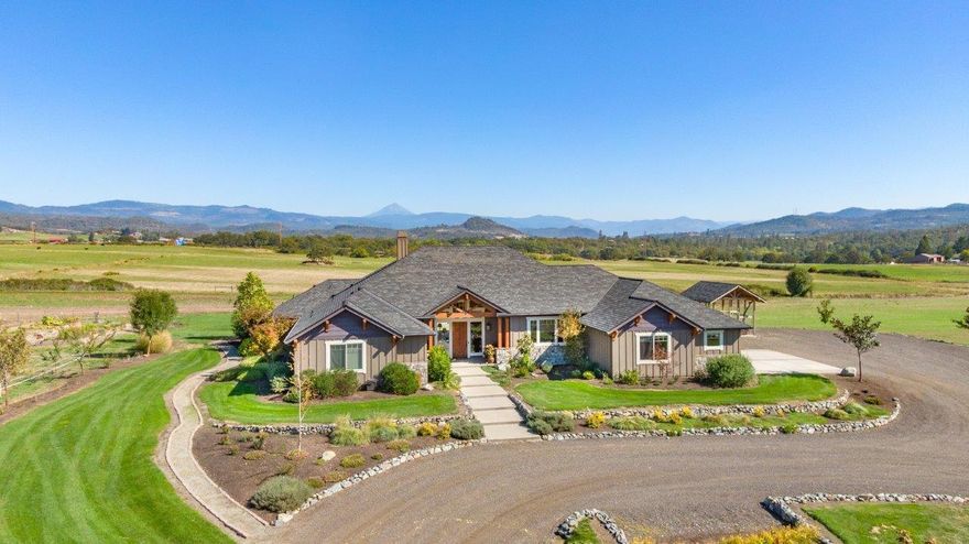 Location, lifestyle and quality! This 53.8 acre estate has all the right features. 3678 square foot home with quality and custom touches that surpasses many others and a floor plan to suit a variety of lifestyles. The property itself features two legal parcels, 20.3 irrigated acres, a second home, shop, barn and a fabulous pond. The gated entry brings you by the pond and up to the main home. Enjoy your afternoons and evenings on the back patio complete with a fire pit. Coming in the front door is a great room, dining area and island to the kitchen. Plenty of counter space, Viking range oven and lots of room to cook and prepare your meals. The master suite has fantastic views out to Mt. McLoughlin. Two of the bedrooms are connected by a Jack n Jill bath and the other bedroom has a bathroom just out the door. In addition there is a den and large office. Geothermal floors and heated tile. Great well and second home has its own septic.