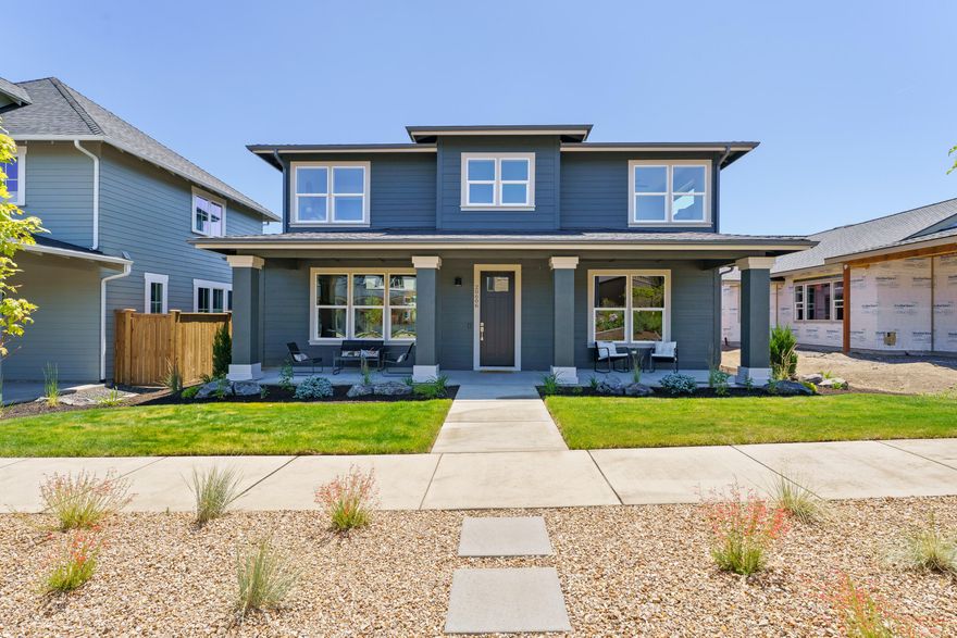 This spacious two-story floor plan by Stone Bridge Homes NW features a private primary suite on the main level, separate from the living space for ultimate comfort and privacy. The open-concept layout is perfect for modern living, with a functional kitchen that seamlessly flows into the dining and living areas. Enjoy easy access to your backyard with a patio off the kitchen. The attached alley-load two-car garage offers convenience and additional storage space. Upstairs, you'll find a versatile loft, three spacious bedrooms, an optional 5th bedroom/bonus room, and a full bath. This home blends style, functionality, and comfort, making it the perfect place to call home. Don't miss your chance to own this beautiful new build in Countryside!