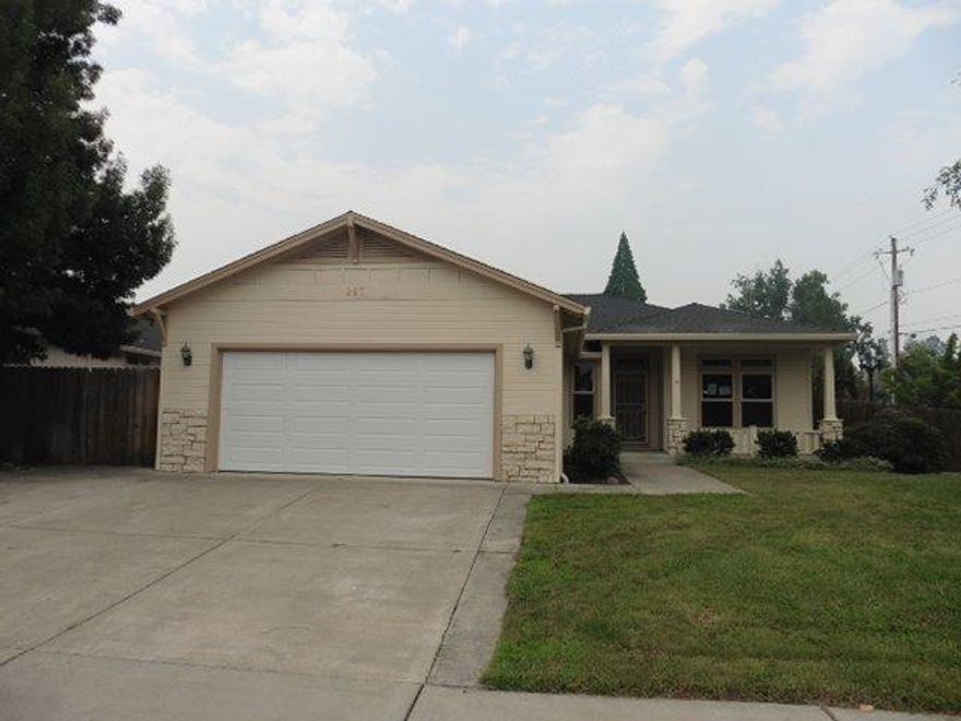 Great Central Point home located on a corner lot with a large fenced back yard including a covered patio and great curb appeal. Inside offers nice upgrades including granite counters, stainless appliances, wood and tile floors and new carpet. Floor plan offers 4 bedrooms and 2 bathrooms, a dining room and nice, open great room concept.