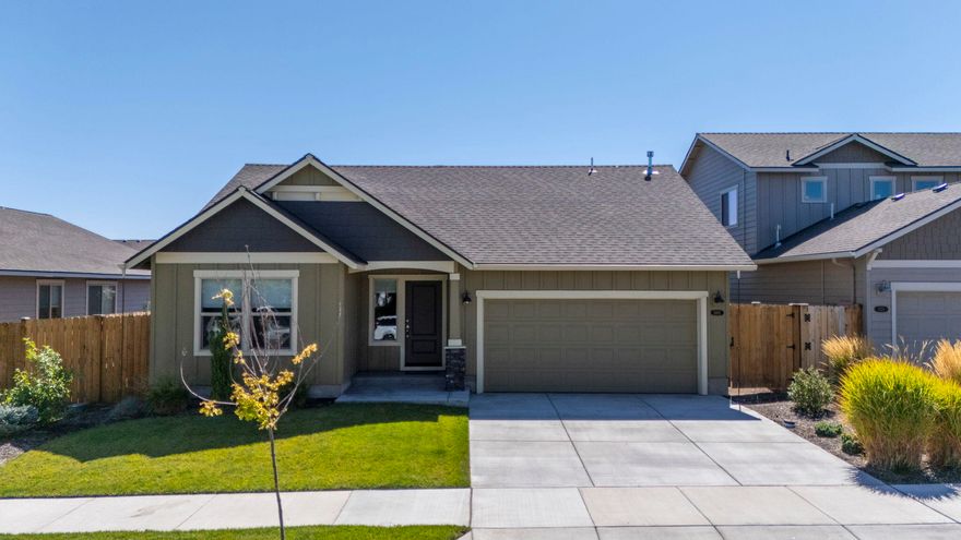 Absolutely gorgeous single level home in the heart of Redmond. Better than new 3 bedroom, 2 bathroom Charity Floor-plan by MonteVista Homes built in 2020. This home is turn key and has been maintained impeccably. Spacious entry way opens up into the expansive great room floor plan complete with entertainers kitchen. The owner thoughtfully made selections with the builder, expanding the laminate flooring into the living space and adding a luxurious jetted tub in the primary suite. Fully Fenced and landscaped with a wonderful covered patio allowing you to enjoy the spacious backyard year round.