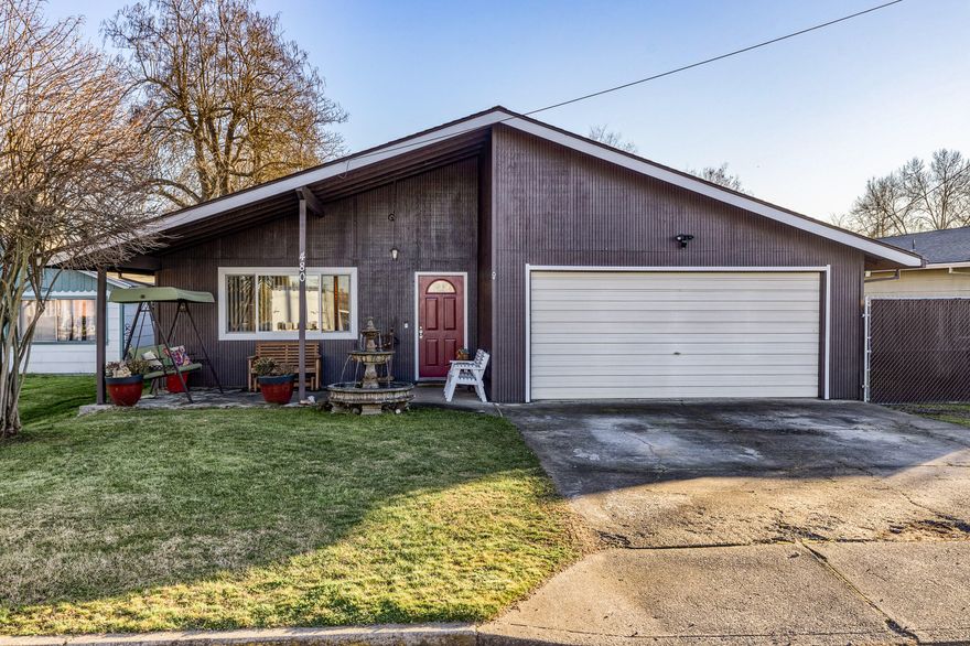 Great, well cared for and updated home on a large lot. The kitchen features granite counters and stainless appliances. Kitchen and Bathrooms have tile flooring and custom hickory cupboards. Nice size master w/walk-in closet and en suite bathroom. Both bathrooms have a tub/shower combo. The laundry room is in the hallway and has lots of shelving. The living room has recessed lighting and opens to the dining room that has a slider to a large covered patio. Good-sized fenced yard w/ raised garden beds, green house and shed. A double gate to the backyard makes it just right for your R.V. or toys. Double car garage w/workbench.  Some other upgrades that make this a nice one are ductless heat pump, tankless hot water heater, extra attic insulation, alarm system and the many smart features. Great home for first time buyer, investor or retiree.