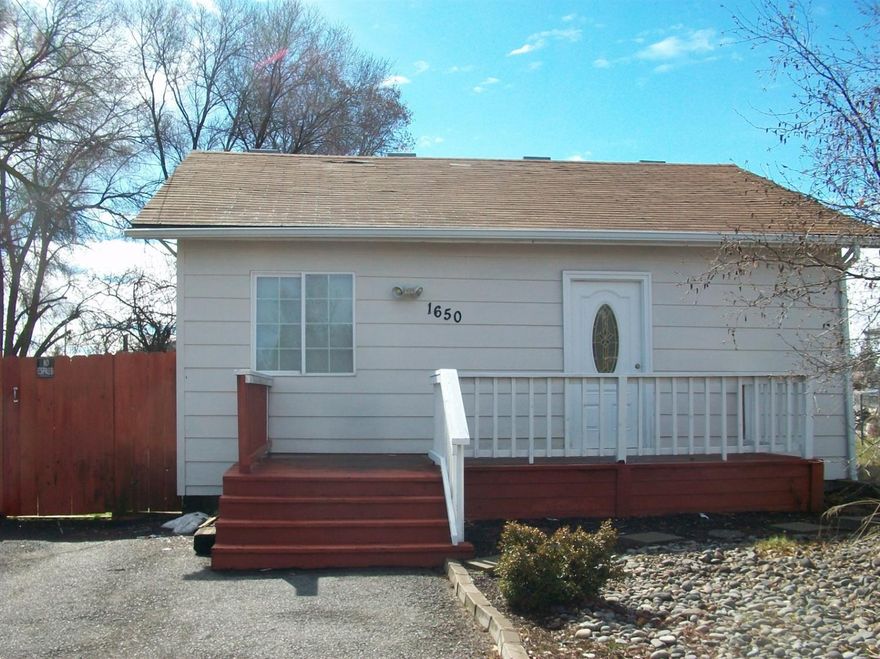 Cute updated 2 Bedroom, 1.5 Bath Cottage features fresh paint inside and out, all new flooring, new cabinets, new hot water heater, new kitchen, vinyl dbl pane windows with new blinds. Detached one car garage with carport. Large fenced yard with a concrete patio. Close to schools, shopping, OIT and Sky Lakes Medical Center. Off street parking and space to park a camper or trailer. All of this at the end of a cul-de-sac.