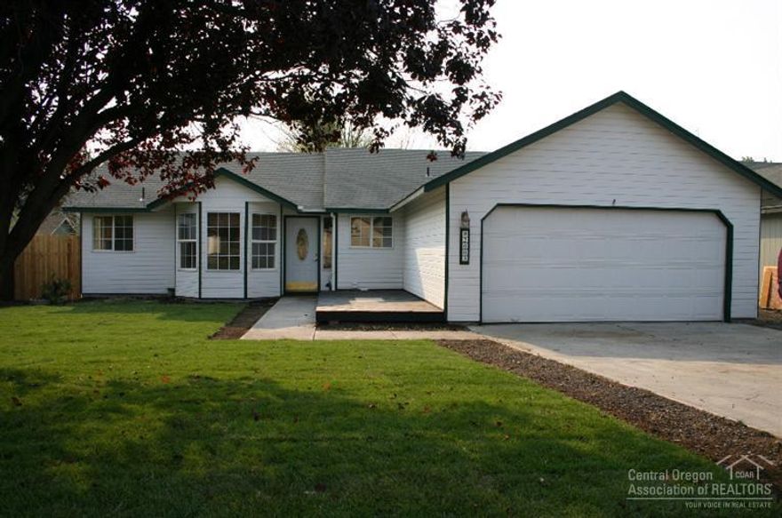 Spacious home in SW Redmond ready for new owners! Vaulted great room plan, open kitchen w/breakfast nook & plenty of counter space & cabinets. Custom window treatments & closet built ins. Granite counters in both bathrooms, tiled floor & large laundry room. Finished garage, auto sprinklers, fully fenced for pets. All new lawns - ready for fall flowers!