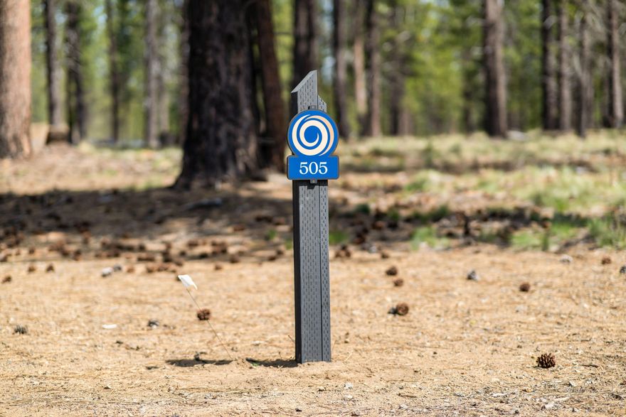 Introducing Wild Pine Homesites at Caldera Springs! Explore our newest neighborhood — where serene water views meet forested landscapes. Nestled in our scenic northern section, Wild Pine Homesites offer an unmatched opportunity to experience the coveted Caldera Springs lifestyle. Limited-time incentives include 5% off the list price and Developer paid HOA dues through December 31, 2026 for Lots under contract by December 31,2025. Homesite 505 is a stunning .47 acre homesite, large enough to accomodate a 6 bedroom home, and backs to a picturesque pond & water features. Framed by towering pines and basking in year-round sun, this lot provides the perfect setting to design and build your custom dream home. Owners enjoy special access to the Forest House Amenity & Aquatic Center along with golf, fitness, pickle ball, tennis, pools, kayaks & paddle boards. Caldera Springs is located near Sunriver, just 15 minutes to Bend and 30 minutes to world class skiing at Mt. Bachelor. Taxes TBD.