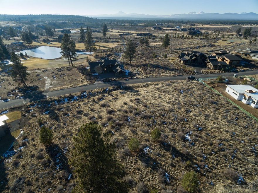 Beautiful homesite in Tetherow's Crescent is ready for your dream home. Elevated and tiered site with Cascade Mountain and golf course views to the West and Broken Top golf course views to the East. Tetherow offers a variety of home styles and is Bend's most sought after golf course community. Members enjoy the community pool, work out facility, 3 restaurants and 2 hotels. Tetherow is the gateway to Mt Bachelor for skiing, lakes and hiking. Phil's trail and the rivertrail are at your doorstep! Just a few roundabouts to downtown and the Old Mill.