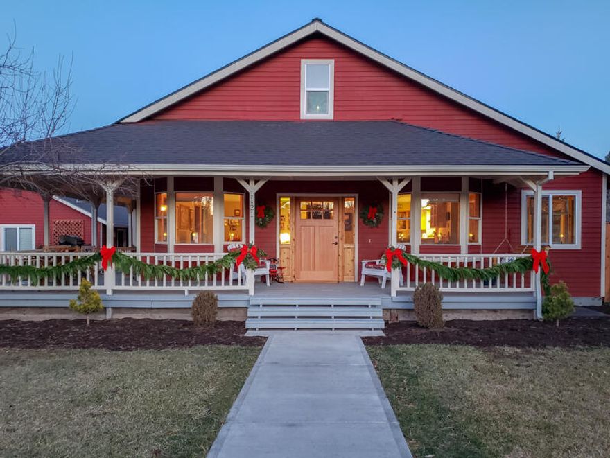 Whether sitting on the porch swing of the 500 sf wrap-around porch or entertaining guests under the 16' X 22' pergola, this house is designed for indoor/outdoor living! Charming, remodeled farmhouse w/ window seats, Canadian maple floors in LR/BRs, w/ remaining floors tiled in slate & accent tile. Remodeled kitchen w/ granite countertops, open shelving, beverage cooler, ss appliances & backsplash w/ utensil rack. Pass-through dish access & French doors open to the solar-efficient sunroom & out to the patio. Large master with sitting area, tiled shower & French doors to private deck.  Murphy bed makes the 3rd BR ideal for a guest room/office.  Laundry rm has a custom folding table, new furnace & spiral staircase to the partially finished attic.  Sitting on nearly half an acre, this home has an in-ground, automatic sprinkler system, 3-year-old fruit trees, large lilac bed, knock-out roses & boxed garden plots w/ plenty of extra room. Country charm right in the heart of Sisters!