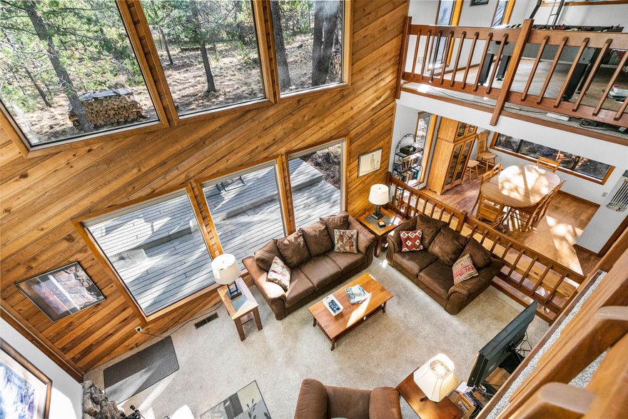 This is the place for Sunriver fun! Home is in a terrific location, just a short walk or ride to the river and all Sunriver amenities all on a .28 acre lot. With two bedrooms, two bathrooms and a spacious loft (could be a 3rd bedroom w/ closet) there's room for you and your guests. Enjoy floor to ceiling windows, lots of natural light, open floor plan, vaulted ceilings and cozy fireplace makes this home live larger than it is. This is an active vacation rental with strong rental income and is being sold fully furnished.