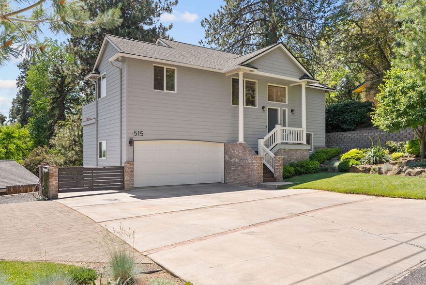 Fantastic location in the heart of Bend's Westside! Immaculately maintained 3BR/2.5BA home, featuring light-filled spaces, beautiful southeast views and incredible walkability to Newport Avenue amenities and Downtown Bend. Split-level, open concept and Great Rm w/ spacious dining area, cozy gas fireplace & access out to the upper deck overlooking the treetops and expansive views of Lava Butte, the Paulinas and Pine Mountain. Light & bright Kitchen w/hardwood floors, ample cabinetry and bar seating for informal dining. Private Primary Suite on main level offers access out to deck, recently updated bath with dual solid surface vanity, and walk-in closet. Lower level: 2 additional bedrooms, full BA with shower/tub combo & laundry room. Oversized 2 car garage with workbench area & plenty of room for all your Bend gear. Recent updates include newer roof (2020) new HVAC, water heater, Trex decking, exterior and interior paint. An outdoor enthusiast's dream location and a rare Westside gem!