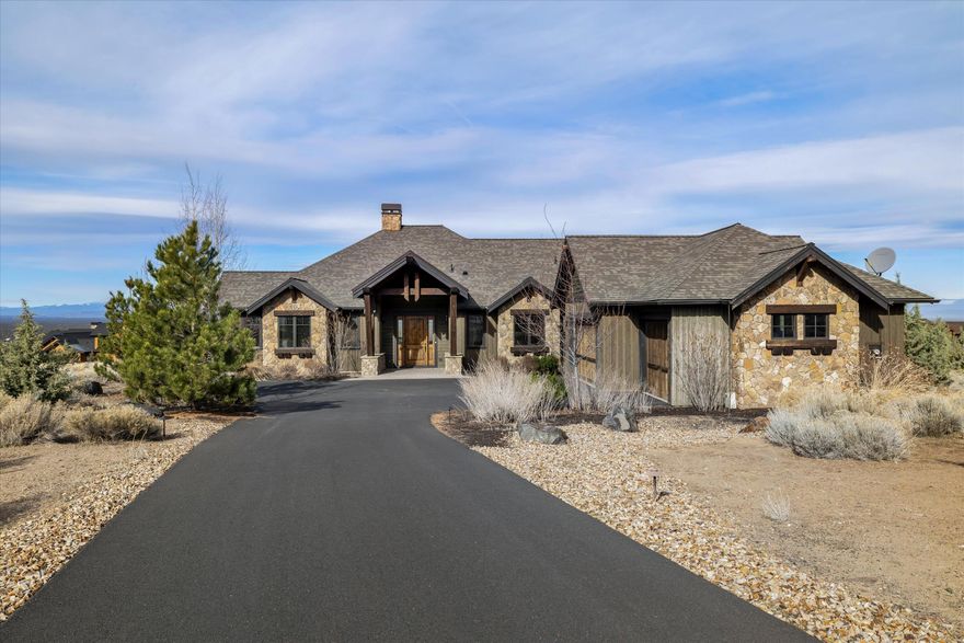 Exceptional home offering an unbeatable combination of luxury & comfort, all w/ spectacular views of the Cascade Mountains. Featuring vaulted ceilings as you enter, the home exudes an open & airy feel, perfect for modern living. The open great room is enhanced by vast windows, beautiful finishes, floor to ceiling stone fireplace, creating an atmosphere of elegance & warmth. The home boasts two generous bdrms, each w/ large closets for ample storage, a Jack & Jill bathroom providing convenience & privacy. The primary bdrm is a true retreat, complete w/ a private entrance to the expansive outdoor deck, where you can enjoy the stunning views in complete tranquility. The luxurious bathroom is designed for ultimate relaxation, featuring a spacious shower & soaking tub where you can unwind while taking in the picturesque surroundings. Step outside to the deck, perfect for relaxing in the fresh mountain air. The stone fireplace & outdoor kitchen is ideal for entertaining.