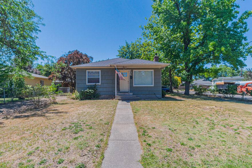 Welcome to this charming home built in 1953 and located in an established southwest Medford neighborhood. Situated on a spacious corner lot, this 3-bedroom, 1-bathroom home features many updates and offers a unique bonus in the form of a converted garage that serves as a versatile fourth bedroom, home office, or guest space. This space also has its own private entrance for easy access, privacy and convenience.

The living room has hardwood floors and a wood burning fireplace for those chilly winter nights. The kitchen is open and perfect for family meals and entertaining The other 3 bedrooms are nicely sized and provide both privacy and ample closet space.

Enjoy outdoor summer activities with an above-ground pool — perfect for splashing around on those hot summer days or hosting backyard gatherings. The backyard also offers room to garden, play, or just relax in your private setting. 

Don't miss out on this one, schedule your showing today!