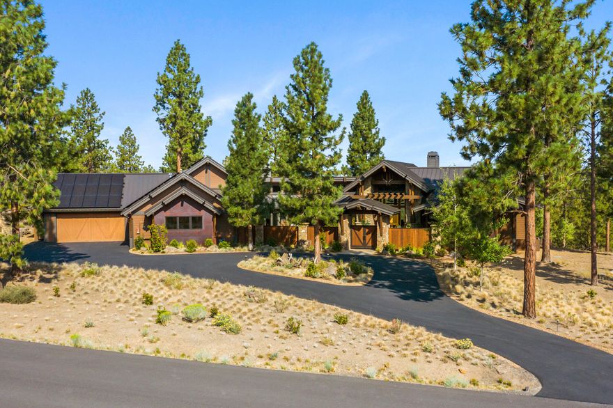 An inspiring and completely private setting located in the coveted Tree Farm community on Bend's Westside! Sited on a premier 2 acre lot, this classic Northwest masterpiece by Norman Building offers an exceptional, SINGLE LEVEL floorplan w/stunning Cascade and Shevlin Park views. Natural design elements include dramatic timber beams, stone, warm wood and steel accents throughout. Exquisite Great Room features wood burning fp, soaring ceilings and windows framing the Cascades and tree-lined vista. Chef's kitchen w/concrete counters, extensive island and Thermador appl. Family Room w/gas fp. Primary Suite features fabulous window seat looking out to the views and spa-like BA w/quartz vanity, soaking tub and tiled shower. Private home office. Multiple outdoor spaces to enjoy: Entertain al fresco on the covered patio w/outdoor fp, relax by the firepit, or begin the day in the delightful front courtyard w/tranquil water feature. 4 car garage. Moments to Westside amenities and schools.