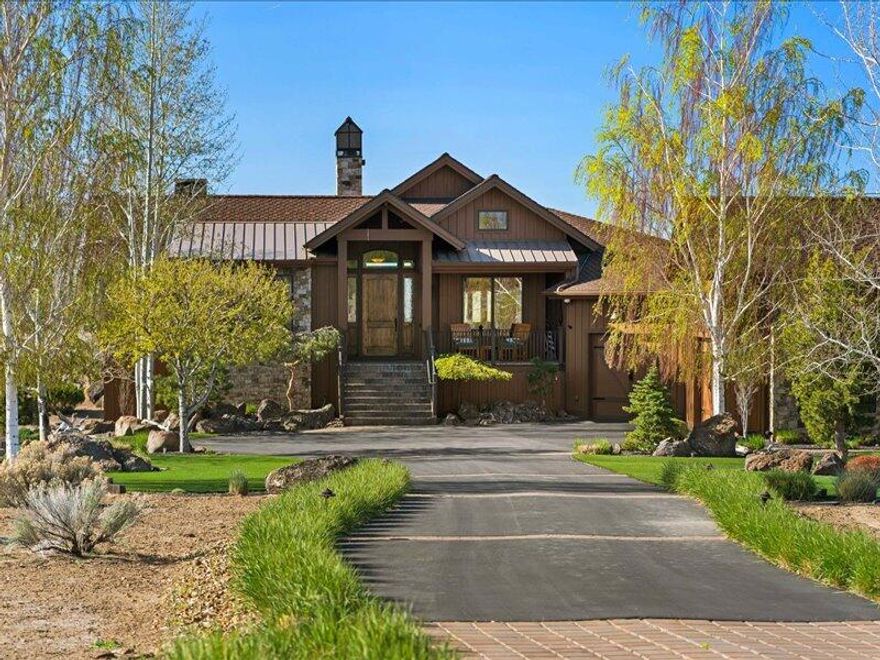 Excellent opportunity to live on the golf course, while enjoying privacy.  Quality construction at $453 psf.  You need to see to appreciate the craftsmanship.  Situated on a 3/4 acre lot overlooking the 15th fairway of Brasada Canyons Golf Course. A custom-built masterpiece featuring beautifully crafted wood radius beams, hand hewn oak floors and custom designed stair rail, this home combines timeless elegance with modern functionality. Two identical primary ensuite bedrooms on each level with fireplace, walk-in shower, ample closet space, jetted tub and double vanities. Lower floor includes spacious family room with fireplace. 200 bottle capacity wine cellar with wet bar, making this the ideal space for both intimate gatherings or grand celebrations. In addition the lower level offers a 2nd bedroom and tons of storage space. Outdoor kitchen, hot tub and 2 water features create the perfect setting for outdoor entertaining.