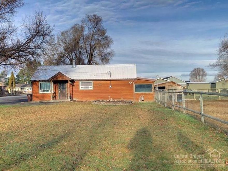 Adorable 3 bedrooms, 1 bath home on .63 acres with irrigation. Gorgeous double sided fireplace, hardwood floors, stainless steel appliances, endless hot water on demand, bathroom has jetted tub/shower combo surrounded by granite. Property is fenced and crossed fenced with 2 loafing sheds. Perfect setup for your animals!
