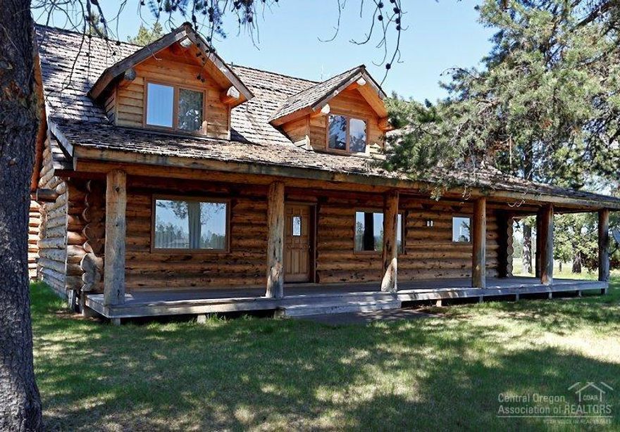 Perfect hunting lodge/cattle ranch. Eligible for LOP elk & deer tags. Hand scribed lodge pole log home on almost 400 acres. Relax and enjoy wildlife as you sit on the wrap around porch overlooking the Paulinas and meadows. Master bedroom on main & upstairs loft area perfect for office or hobbies. Detached log 2 car garage with upstairs bonus area with plumbing for bath. Separate 2925 SF shop with cement floors, lean-tos, plumbing/electricity. Rustic 3360 SF barn. Acreage is heavily treed & on farm deferral.