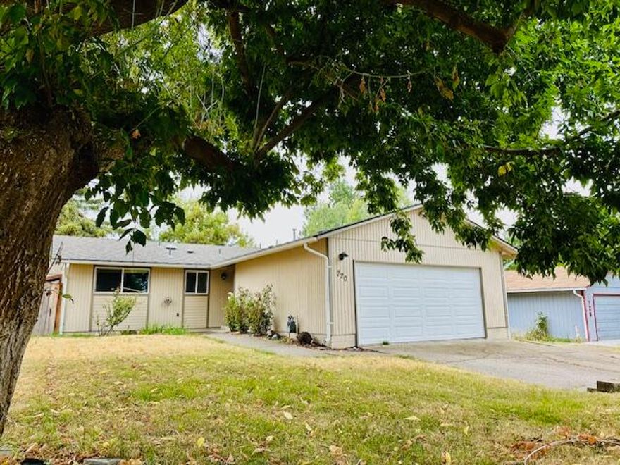 Motivated Sellers!! Adorable 3-Bedroom Ranch with Spacious Fenced Backyard! Welcome home to this charming 3-bedroom, 1-bath ranch-style gem, perfectly situated just minutes from shopping, schools, and the hospital. Ideal for first-time buyers, downsizers, or anyone looking for easy, single-level living! Step inside to find a bright and open floor plan featuring low-maintenance laminate flooring, a cozy gas fireplace, and a beautifully updated kitchen with granite countertops—perfect for cooking and entertaining. The new automatic garage door adds convenience and modern curb appeal. Enjoy outdoor living in the large, fully fenced backyard, offering plenty of space for pets, gardening, or weekend barbecues.