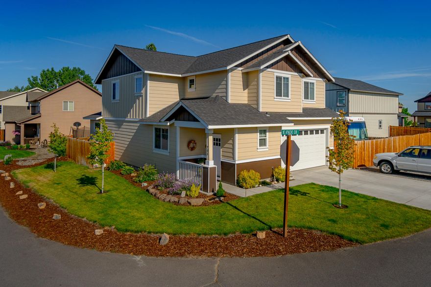 Rare gem in North Redmond! 4 bedroom (or 3+bonus) 2.5 bath home with den/office + RV parking. Immaculately cared for & situated on a corner lot, this property is move in ready w/tons of upgrades. Slab granite counters & window sills, arched entries, professional paint & wood flooring & tile in the main living areas. All bedrooms & laundry conveniently upstairs, all with spacious closets & oversized rooms. Outside you'll discover the perfect lawn & flower gardens, extended patio & concrete sidewalks all the way around to the RV spot which accommodates a full size coach. Triple tandem garage makes a great work shop or storage space. Gas forced air, A/C, auto sprinklers & fully fenced! Don't miss this better than new home!!