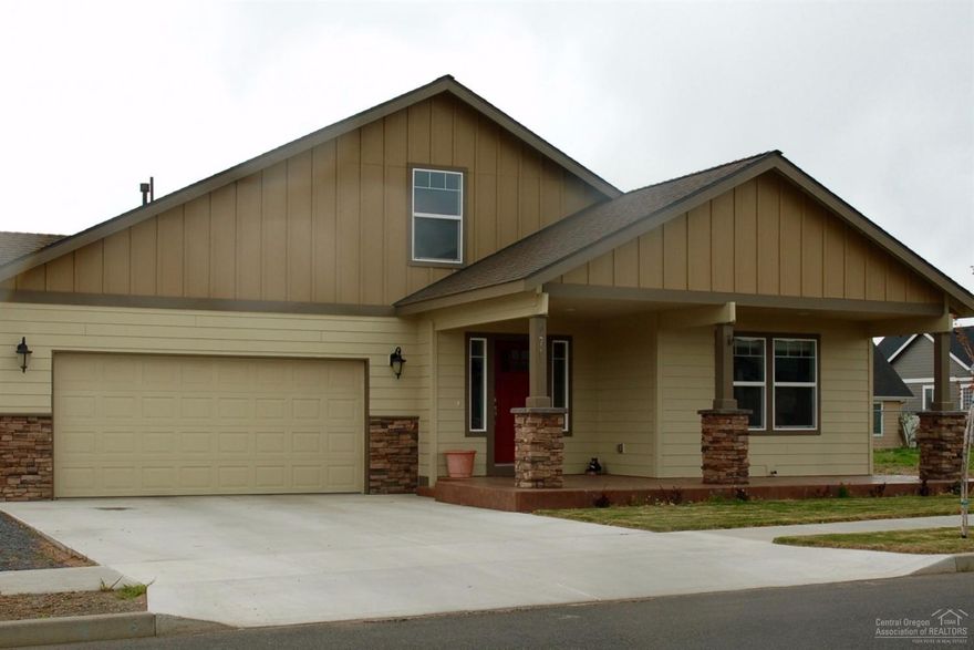 Beautiful custom home in newer neighborhood. Open great room with gas fireplace, large kitchen with stainless steel appliances and a double oven, built in custom desk, large master bedroom, master bathroom has beautiful walk-in tile shower and walk-in closet. There is a bonus room above the garages that is approximately 300 Sq. ft. that is not included in the square footage of the home, would be a great game room or craft room. Close to new grade school and shopping.