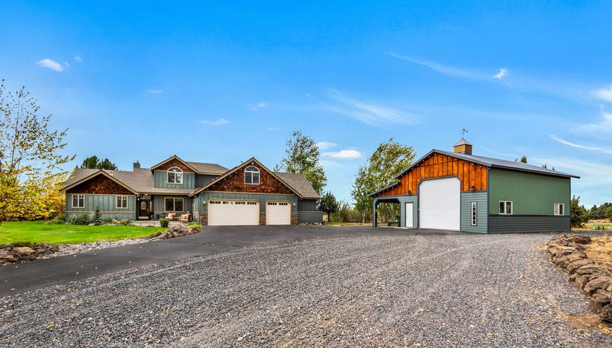 Spectacular Cascade Mountain Views on 20 acres in SW Redmond - minutes from town. 3044 sq ft home with 4 bedrooms - 1 master suite and 1 guest suite and an office/den all on the main floor. Guest suite has two rooms (approx. 600 sf ft), including master bedroom, bath, walk-in closet and a sitting area. Main living area has a light, bright great room that boasts cathedral ceilings, fireplace with propane insert, and beautiful picture windows. Kitchen counters are concrete with tile backsplash. Laundry room has ceiling to floor cabinets and washer and dryer space behind doors. Two bedrooms, bonus room, and a full bath on the upper floor. Three car garage, plus separate 1000 sq ft shop with room to store RV and a tractor. RV pad with full hookups, 14.8 acres of irrigation and 2 lined ponds will be found on the property. New pressurized irrigation system includes 5 acres with underground sprinklers in the front field and the balance has K-line sprinkler coverage.