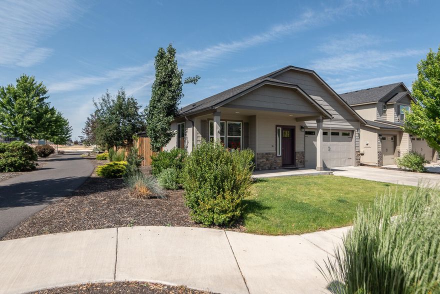 Fantastic SW Redmond location on a very private corner lot with a covered front porch, and covered back patio adjoining the firepit area.   This oasis has a common space as a back yard neighbor, which means privacy!  This home lives large and spacious, full of light and high ceilings. It is new enough to bring peace of mind with low cost of ownership and very low maintenance. Great entertaining kitchen looks out onto the patio and is open to the dining and living room.  The Office/Bedroom also has incredibly functional lighting and storage for those hobbies. Functional storage was added to the kitchen and main suite as well. Community trails surround the property and the new Parks and Rec community center is nearby. Close to Bend, close to the Redmond airport! Come see this well-maintained, lovely home with your favorite realtor today!