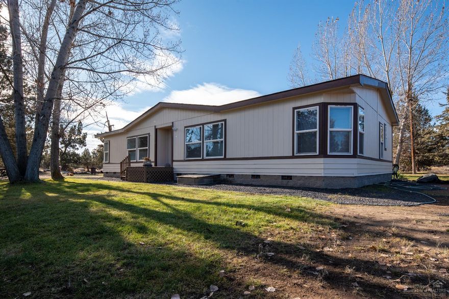 Hard to find 10 acre property in the heart of Central Oregon's Crooked River Ranch. With 1876 sf of living space, this home offers a comfortable layout w/4 spacious bedrooms, 2 full baths AND office/bonus room. Kitchen is open to dining area complete w/built in buffet for extra storage space, plenty of cabinets & tons of windows to enjoy the wildlife from the cozy interior. Central living area w/formal entry way & vaulted ceilings. Bonus space/office adjacent to Master Ste has its own private entrance & could be used as extended family living space or converted to a 2nd residence. Outside you'll find a workshop, covered storage spaces & easy to maintain landscape w/mature shade trees. Bring your horses & you can ride out the west property line to miles of trails & BLM land! Private well, garden space & plenty of room for all your toys. CRR is the place to be for world class fishing, golf, horseback riding, tennis, pool, parks, trails & pristine Cascade Mtn views. Come see it today!<br>