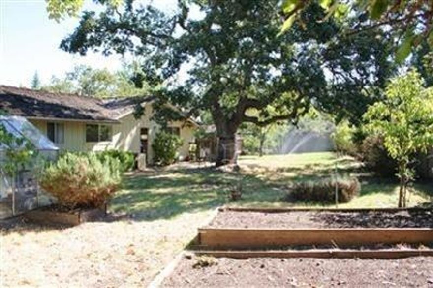 Great opportunity at Oak Knoll Golf Course. Single level, 1461 square foot, 2 bedroom, 2 bath home with hardwood living and dining, galley kitchen, nice brick fireplace, updated gas furnace, air conditioning, and water heater, big patio area, mature oaks, and an extra large lot. Plenty of room for shop, RV, extra living, gardens, play area or??? Don't miss the chance to make this your showplace.