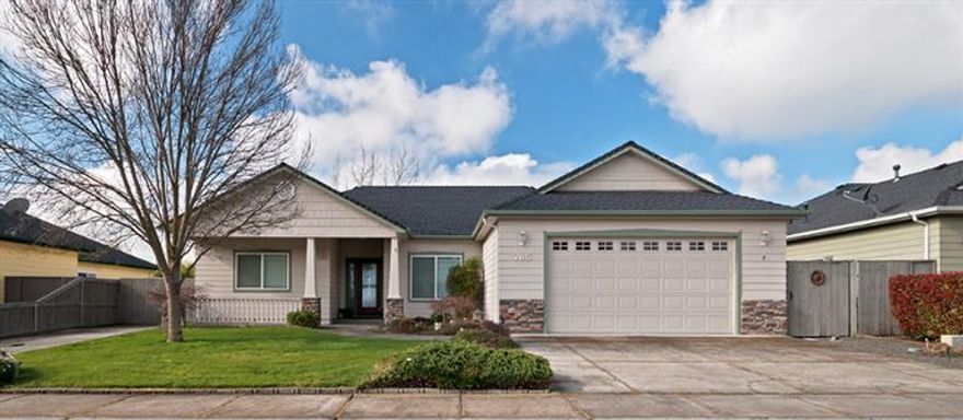 Charming home with open floor plan in very desirable neighborhood. Great room with vaulted ceilings, gas fireplace, formal dining room, spacious kitchen and nook with hardwood floors. Split floor plan, large master with coffered ceiling, walk-in closet. Darling front porch, RV parking (boat or trailer), large patio with two sliders from house. Two car garage with work bench and cabinets.