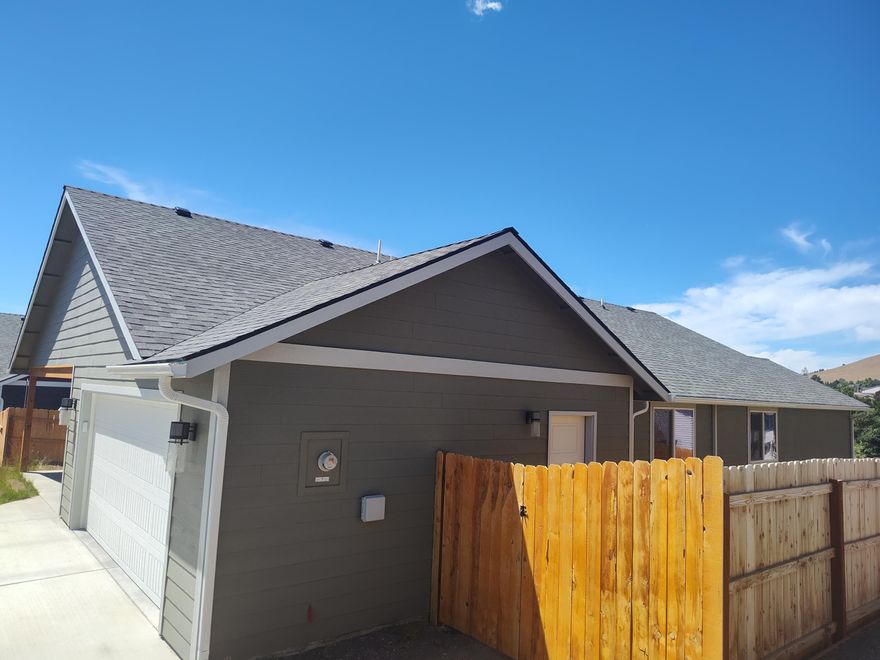 Beautiful 2022 Turn Key home with fully fenced backyard, beautiful custom cabinetry, granite countertops and vaulted ceilings! Only a short distance from Steens Sports Complex and with incredible views of Hogsback Mountain and with a myriad of outdoor recreation nearby. The over 1800 square foot, Energy Star Certified home with 3 bedrooms and 2 bathrooms features a large walk- in pantry and laundry room as well as hardwood floors and an open floor plan. The large covered deck invites you to entertain and enjoy your down time with friends and family whilst enjoying some of the best views the town has to offer! Schedule your appointment today to see this lovely home in person!