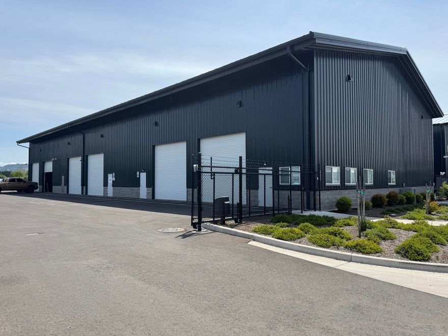 High quality industrial space located in a newer multi-tenant development just North of the Rogue Valley Airport. This approximately 4,500SF space includes two grade-level roll-up doors, high clear span ceiling, gas space heaters, and quality office improvements. Property improvements include a fully fenced lot with secured access and paved parking. Owner will consider additional improvements for qualified tenant.