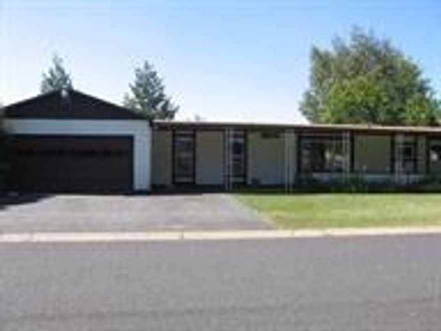 Nice 3 Bedroom 2 Bathroom Manufactured Home With Many Updates. Located In Nice Neighborhood Just Before Mobile Park, On Corner Lot With Small Fenced Back Yard And Sun Room/Mud Room Addition Off The Back Of Home. Central Forced Air With Ac And Newer Water Heater, As Well As Furnace. Large Living Room With Formal And Informal Dining. Good Size, Open Kitchen With Breakfast Bar, Newer Stove Top, And All Appliances Included. Spacious Covered Patio Off Front Of Home With Wheel Chair Access (Ramp To Be Repaired).Great 2 Car Garage With Plenty Of Space For Workbench And Additional Storage. $130 A Year For Snow Removal And Additional Rv Parking Space To Be Paid To Hoa.