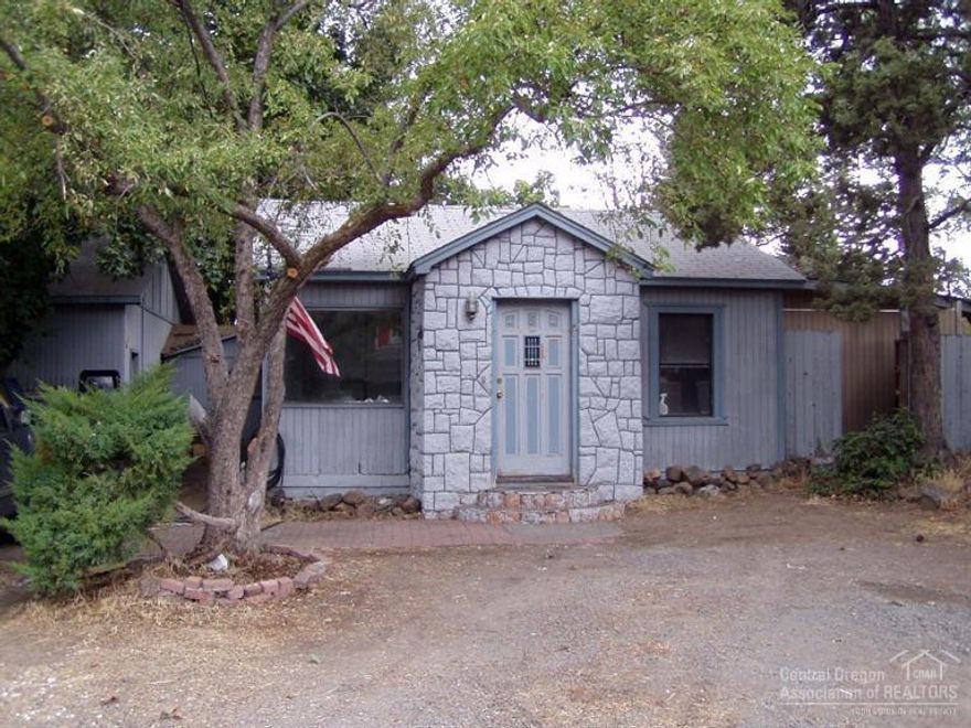 Many development possibilities here with a 12,000 sq. ft. RM zoned lot. Great in-fill project for you and your builder. The existing 2 bedroom, 1 bath home also includes an office. The 1152 sq. ft. shop has plenty of room for your toys and hobbies.