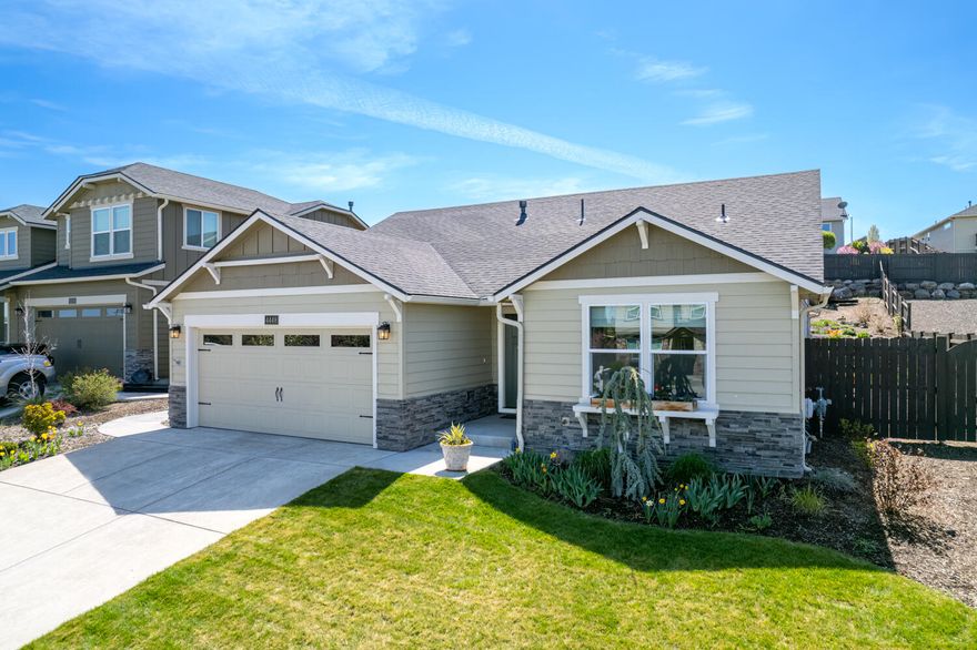 Beautiful Edgewood floor plan built in 2019 & located in desirable Southwest Redmond. Lightly lived in and situated on nearly a 1/4 acre lot, the rear fenced yard is a gardener's dream. Raised garden beds with drip irrigation, dedicated strawberry beds, mature pear, plum, and apple trees. Elevated viewing deck from rear yard provides views from the Cascade Mountains to Smith Rock and the covered patio allows for comfortable evenings spent outside. Home features option for 3 bedroom or 2 bedrooms + a den, hardwood flooring throughout the main living area, open great room concept w/ vaulted ceilings, gas fireplace w/ tile surround, solid surface countertops, full height backsplash, under cabinet lighting, & stainless-steel appliances. Primary ensuite separation w/double walk-in closets. Solar Panels, extended 2 car garage, forced air & A/C. 1 year seller paid home warranty included. Pre-inspection complete.