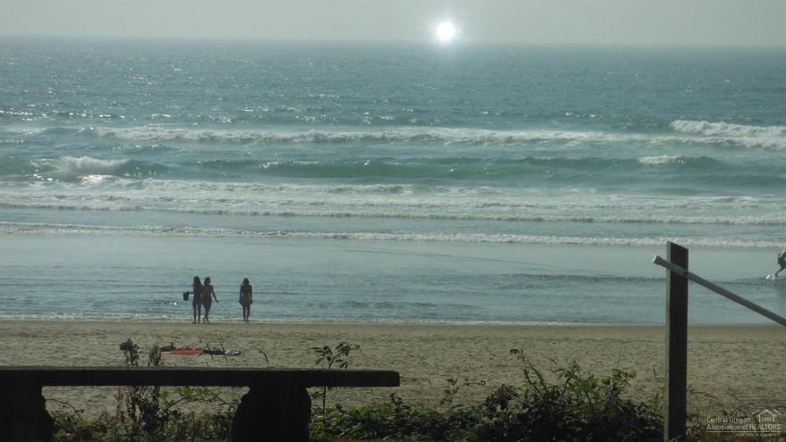 Oceanfront, Hay Stack Rock and miles of sand make this 3b/2.5b, 1310sqft home special! Fireplaces, woodstove, baseboard heat keep you warm on those cool beach evenings. Lg picture windows frame amazing views. Original owners kept the rustic charm while making this a perfect beach get-away. Retro tile, warm wood ceilings and walls, master on the main with two bedrooms upstairs, built-in storage, lg utility room and a garage provide plenty of living space. Outside deck, Beach access, and more!