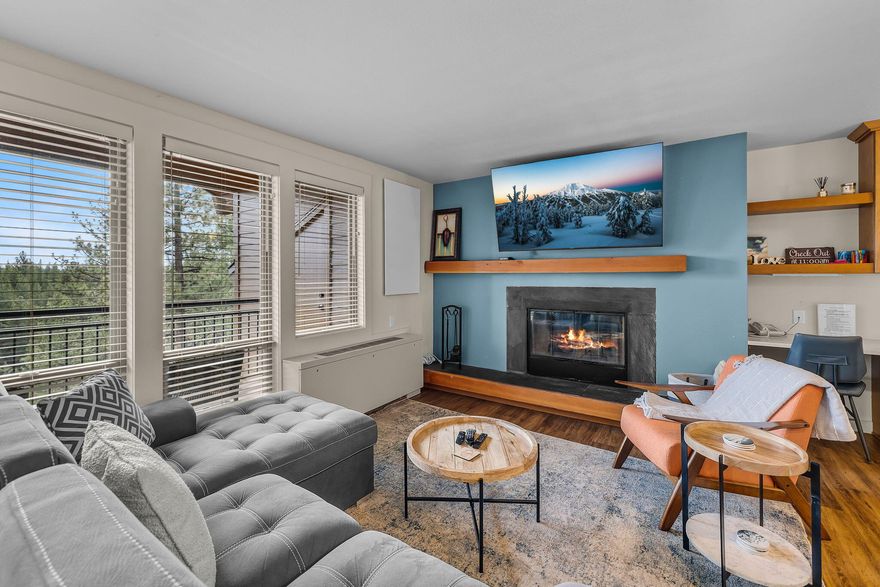 Celebrate the holidays — or any season — in style at the 7th Mountain Resort! This beautifully updated top-floor condo combines Units #1233 and #1234, offering 1 bedroom, 2 full baths, and sleeping for six. Perfect as a personal retreat and income-producing short-term rental, it's fully furnished with modern finishes, solid surface countertops, and a private deck overlooking the forest. Imagine Christmas with family, enjoying crisp mountain air, heated pools, hot tubs, tennis, pickleball, and scenic trails—all just minutes from Mt. Bachelor. HOA dues include nearly all utilities, internet, exterior maintenance, and full resort access. Turn-key and low maintenance features make this an effortless investment and an unforgettable Bend escape. Come tour during the Open House on December 20th from 12- 2pm or call your favorite Realtor for a private tour!