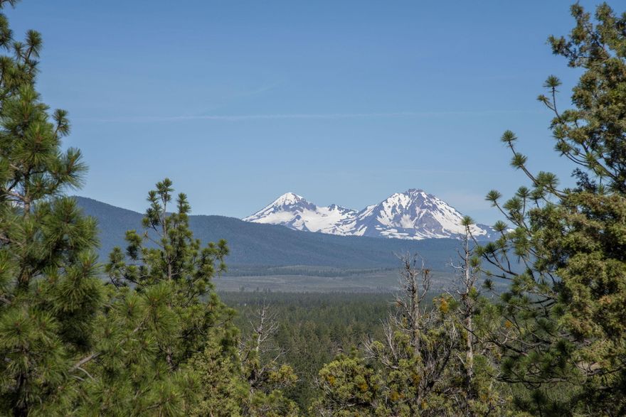 This one-acre homesite offers an unparalleled canvas for your dream home in the exclusive North Rim. Wake up to breathtaking views of Mt. Bachelor, Three Sisters, Mt. Jefferson, and Broken Top, all just waiting for your design and build to showcase. North Rim is known as one of the most prestigious neighborhoods  in all of Central Oregon. The  Rim is known for its expansive homesites, modern and innovating architecture, and easy access to the best of Bend life. You'll love life behind the gates, with the community lodge, pickleball & tennis courts, walking paths & trails, security, and, of course, a front-row seat to the Cascade Mountain skyline.