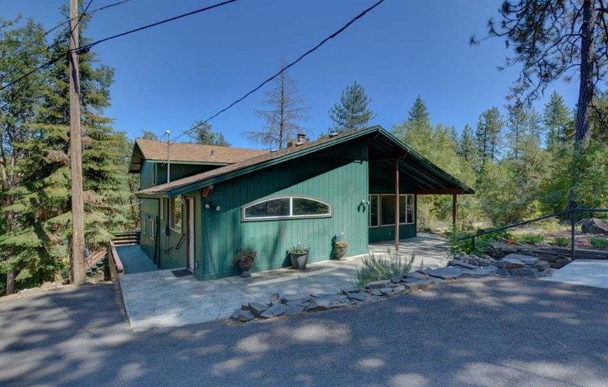 This Gorgeous 6-acre property is located near beautiful Shady Cove. Offering a 2,348 sq ft tri-level home with 4 bedrooms including 2 master suites and 3 bathrooms, in the living room you will find a wall of windows to let the outdoors in including sliding windows for that evening breathe of fresh air. Three bedrooms upstairs (1 master) feature private balcony and a separate entrance to second master bedroom on the main level. The vast kitchen has plenty of cabinets for storage and nice tile flooring, this home also has a family room highlighted by a rock fireplace. Featuring a large wraparound deck great for entertaining provides a peaceful setting with views that stretch across your property with room for all your critters. This property includes a 30x30 fully insulated shop, 36x48 3-stall pole barn and comes fully fenced and cross fenced with security gate backing up to Long Branch Crk. Did I mention the tree house? Call today and schedule your tour!