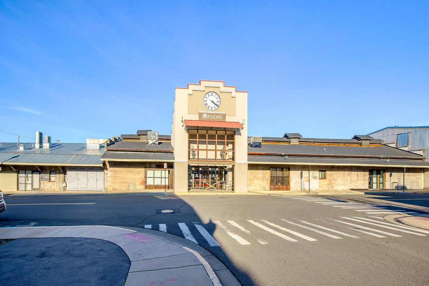 Don't miss this incredible opportunity to own in a piece of Southern Oregon History. This commercial building not only provides 40+ offices, a restaurant style kitchen & coffee bar space, was formerly a primary train station in the heart of beautiful Ashland. Subtle touches of this property's rich history incl. interior railway cables & wrought iron accents paired w/ wooden beams, it's perfectly complemented by contemporary amenities such as high speed internet wifi connections & all the makings of a modern office setup. Larger open spaces to accommodate multiple office personnel/smaller break out spaces this unique commercial building. Ample parking spaces for both auto and bicycle. One room is even utilized as an employee yoga room to encourage a healthy workspace. This building is move-in ready for any large business or rent out spaces individually for a dynamic offering of commercial spaces. See it today.