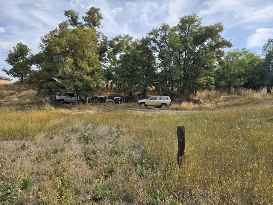 This is a fantastic opportunity to own a city lot that has excellent build potential. Its over a third of an acre, zoned Medium Density which allows for multi unit properties, including single-family, manufactured home, duplex, townhome or potentially larger complex. It currently has utilities available at the property line, but is not further developed. The property has a storage building/bunker that is not hooked to utilities. No HOA or restrictions on this lot, and it's close to the highway for easy access, close to downtown, medical services, and OIT. Priced for a quick sale. Don't miss this opportunity to grab a lot with tons of potential and very little restrictions! Seller will not carry a note. Agent is related to seller.