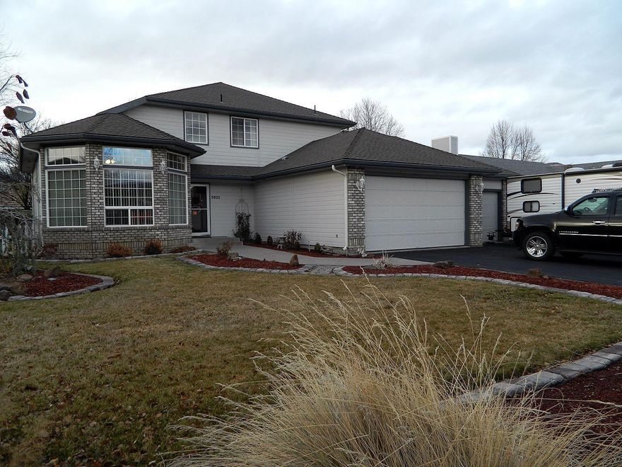 Come check out this Sunset Village beauty. There are 4 bedrooms and 3 full baths with a 3 car attached garage all in 2450 square feet of living. There is hardwood and tile flooring throughout the house. This amazing kitchen has corion counters, island, lighted pantry and do not forget the upgraded Viking gas range. Along with the formal dining that has some built ins there is a living and family room. The large master has double sinks and a walk in closet. There is space for the RV along with an RV electrical hook up.