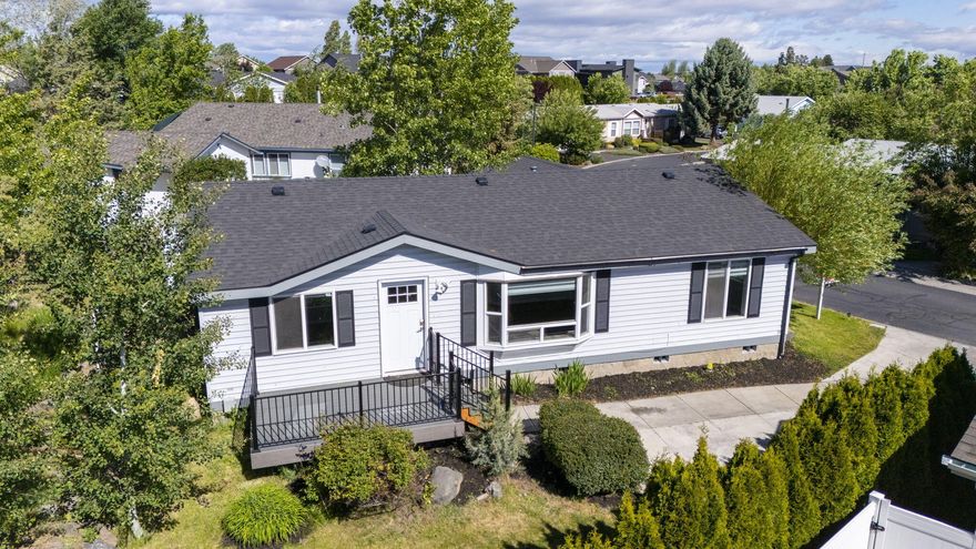 Don't miss this completely refreshed home on a terraced lot. Fully updated just two years ago & turn key ready for new owners! 3 bedroom 2 bath home w/new roof, paint, doors, floors, trim, skylights, cabinets, granite counters & much more. Open layout w/large living area featuring vaulted ceilings, large windows & luxury vinyl plank throughout living spaces. Breakfast bar seating in the open kitchen area, stainless steel appliances included, modern backsplash & hardware + tons of natural lighting. Eating area is spacious w/large sliding glass doors to the back deck. Primary bedroom is spacious w/primary bath featuring dual sinks in vanity & a walk in custom California Closet pack. Two additional bedrooms at the opposite end of the house share a full bath. Laundry room features built in storage & exit to the attached dbl garage. Forced air heat w/AC. Move in ready!! New Trex deck, modern iron rails, custom blinds & Brand new SS dishwasher!