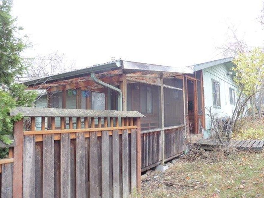 Great opportunity and lots of potential with 2 homes on the same acreage. Main home offers 3 bedrooms and 1 bathroom and is 1300 sq ft and the other offers 2 bedrooms and 1 bathroom with 1104 sq ft. Property offers a detached shop and small storage.